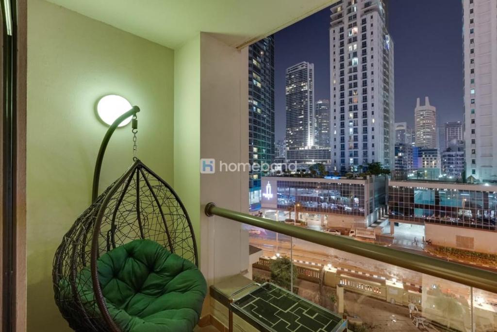 Huge studio with full kitchen, dining table, living area, and sofa bed