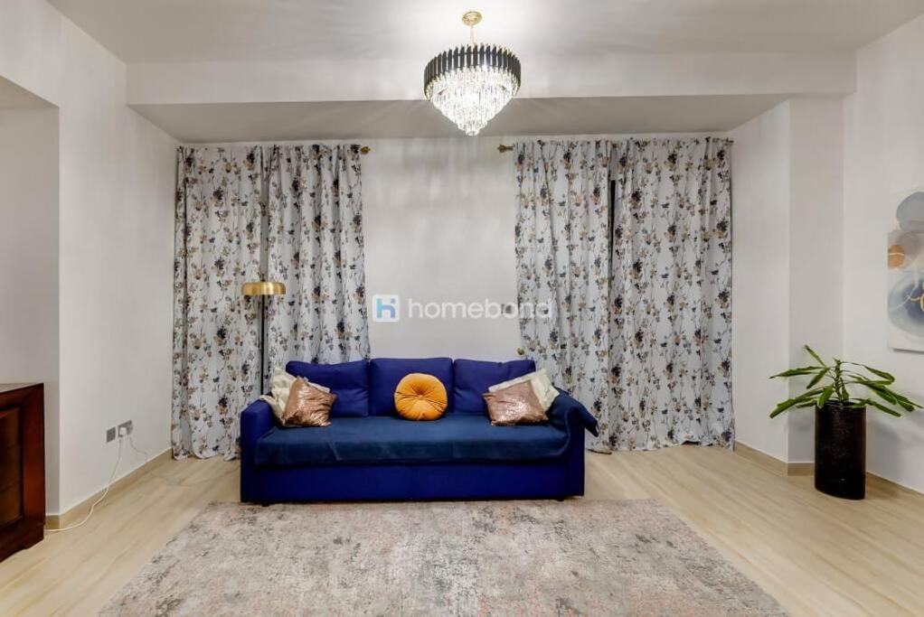 Huge studio with full kitchen, dining table, living area, and sofa bed — photo 4